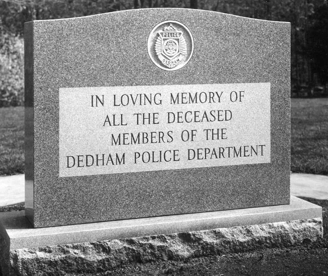 Granite memorial engraved Dedham Police Department memorial